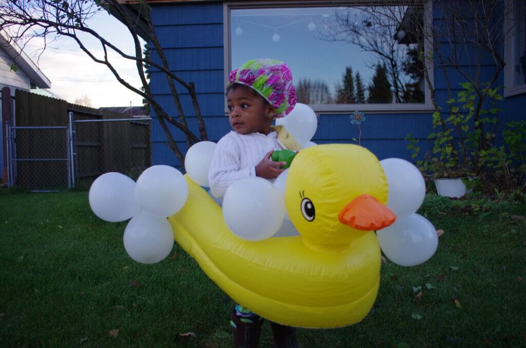 Super cute child in bubble bath costume